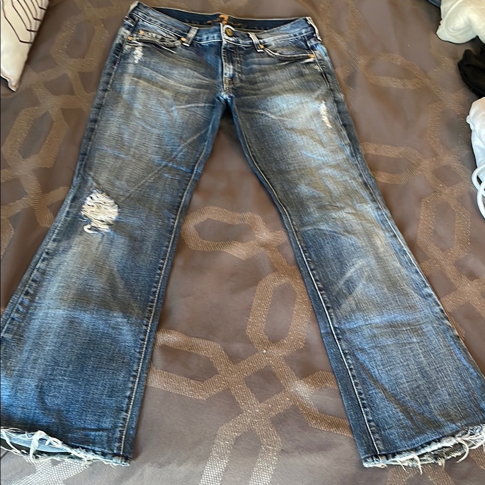 7 For All Mankind Blue Flare Jeans with Distressed Details
